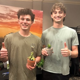 Thank you to everyone who joined us at our Open House yesterday! It was so great to meet everyone and share what we have been working on! two men posing for a picture holding small potted plants