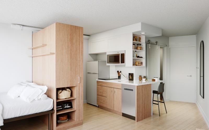 a room with a bed and a shelf with objects on it